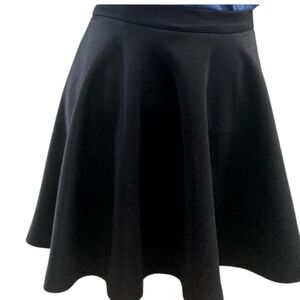 💫REVEMPED Premium Collection Wimen’s A line bow flare black mini skirt.